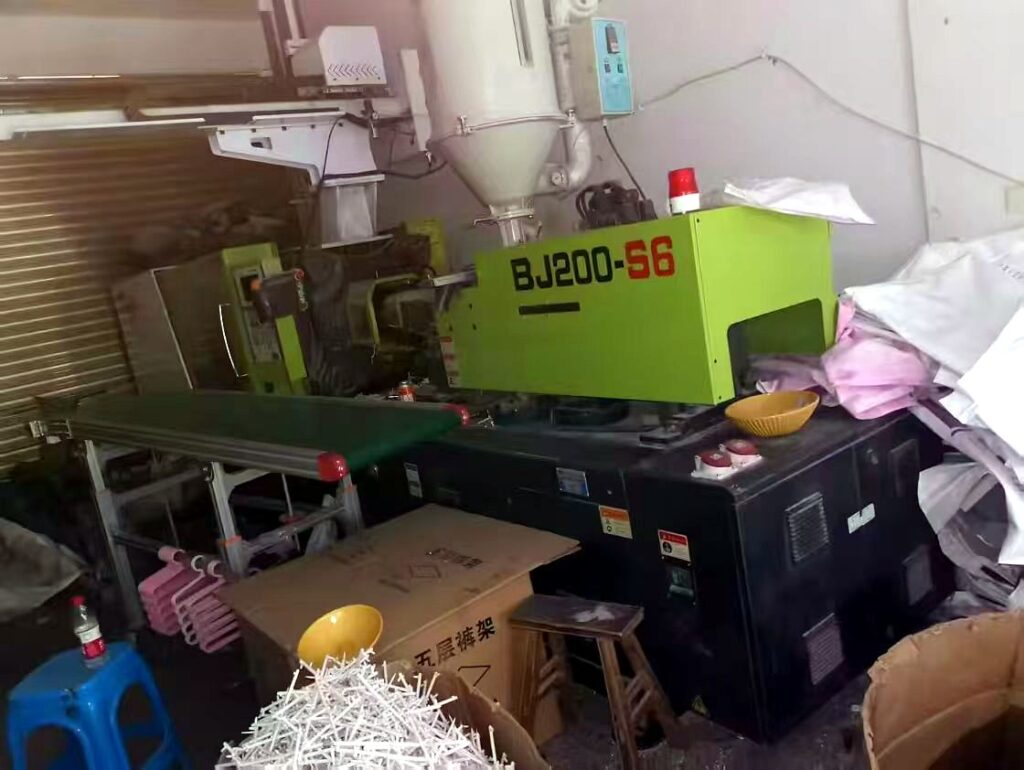PowerJet BJ200-S6 used injection molding machine - front view